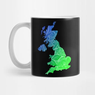Colorful mandala art map of United Kingdom with text in blue and green Mug